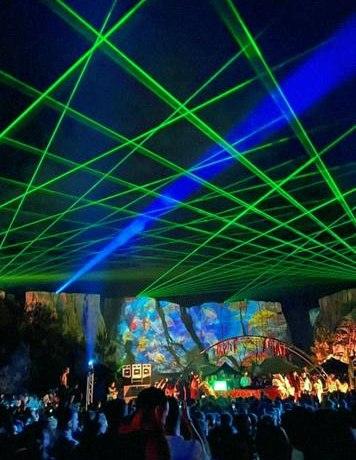Sound-reactive lasers through foliage